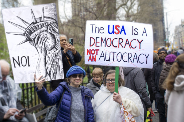 Demonstrators participating in "Hands Off" National Day of Action Protest, New York City, New York,