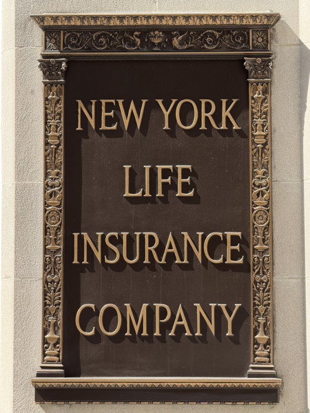 New York Life Insurance Company sign on New York Life building exterior, close-up detail, New York