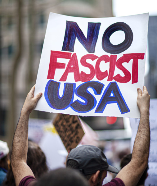 Demonstrators participating in "Our City, Our Fight: Protect Migrants, Protect the Planet" protest,