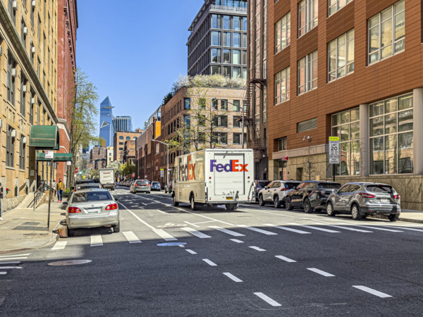 FedEx delivery truck and street scene, New York City, New York, USA