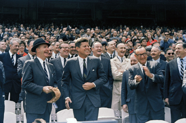 U.S. President John F. Kennedy (laughing), California Governor Edmund "Pat" Brown, (clapping,