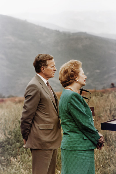 U.S. President George H.W. Bush, accompanied by British Prime Minister Margaret Thatcher,
