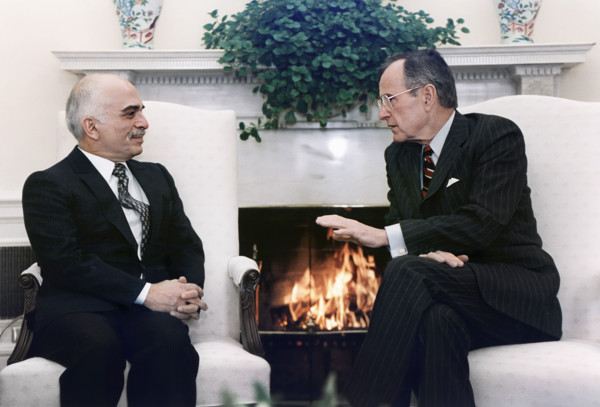 U.S. President George H.W. Bush meeting with King Hussein of Jordan in the Oval Office, White