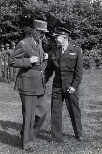 French General Charles de Gaulle, left, chatting with U.S. General Dwight D. Eisenhower during