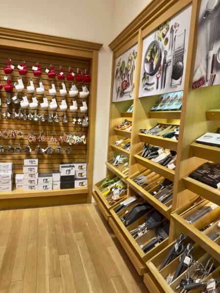 Assortment of kitchen utensils on display shelves, New York City