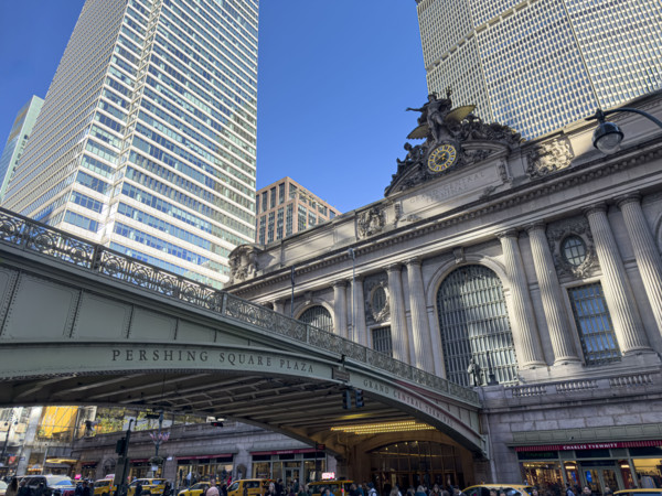 Grand Central Terminal, exterior building detail with view of Park Avenue Viaduct and street scene,