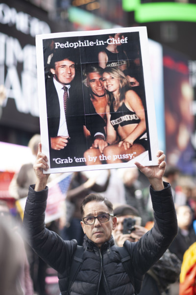 Demonstrators participating in "No Kings" Protest March, Times Square, Manhattan, New York City,