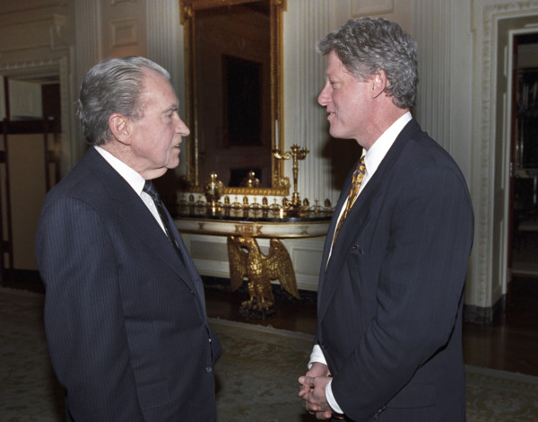 U.S. President Bill Clinton meeting with former U.S. President Richard Nixon in private residence,