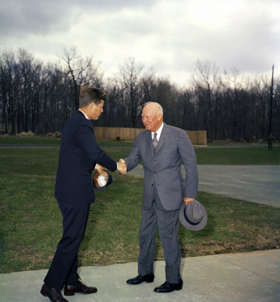 U.S. President John F. Kennedy shaking hands with former U.S. President Dwight D. Eisenhower, Camp