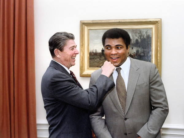 U.S. President Ronald Reagan "punching" American boxer Muhammad Ali in the Oval Office of the White