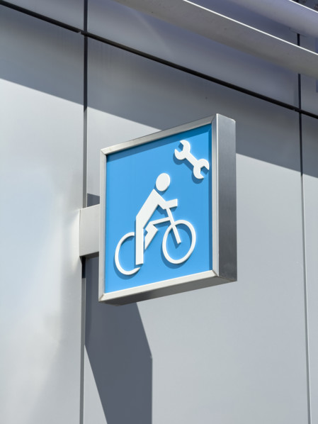 Bicycle tire pump and repair sign along urban bicycle path, Manhattan, New York City, New York, USA