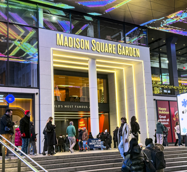 Crowd outside Madison Square Garden entrance at night, Seventh Avenue, Manhattan, New York City,