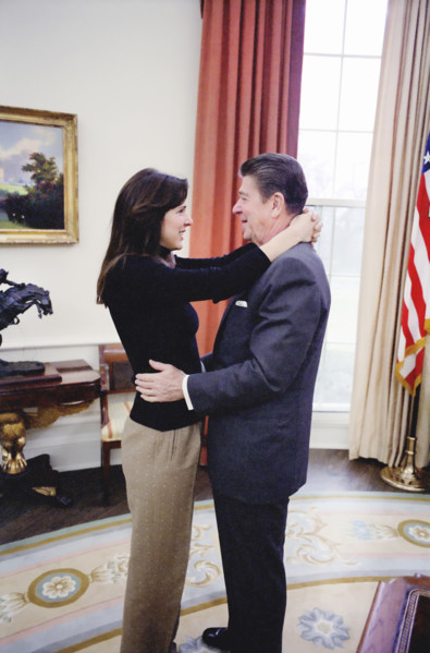 U.S. President Ronald Reagan with his daughter Patti Davis in the Oval Office of the White House,