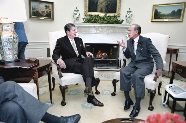 U.S. President Ronald Reagan meeting with Canadian Prime Minister Pierre Trudeau in the Oval Office