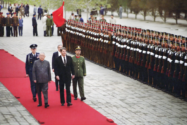 U.S. President Ronald Reagan reviewing Chinese troops during arrival ceremony at Great Hall of The
