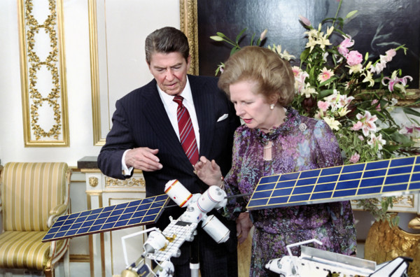 U.S. President Ronald Reagan and British Prime Minister Margaret Thatcher viewing model of manned