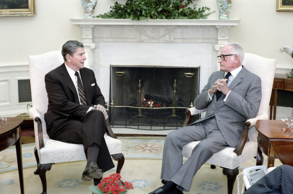 U.S. President Ronald Reagan meeting with Arizona Senator Barry Goldwater in the Oval Office of the