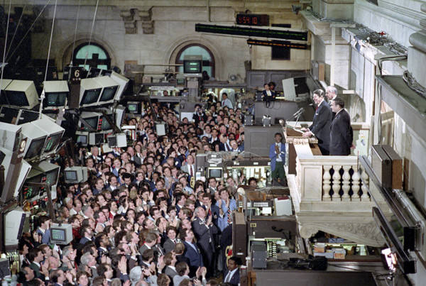 U.S. President addressing New York Stock Exchange employees during visit to the trading floor, New