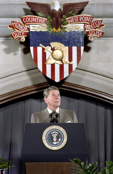 U.S. President Ronald Reagan standing at podium during remarks to cadets, United States Military
