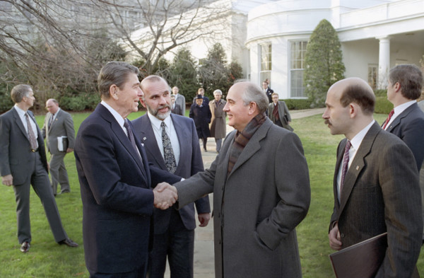 U.S. President Ronald Reagan and Soviet General Secretary Mikhail Gorbachev shaking hands on White