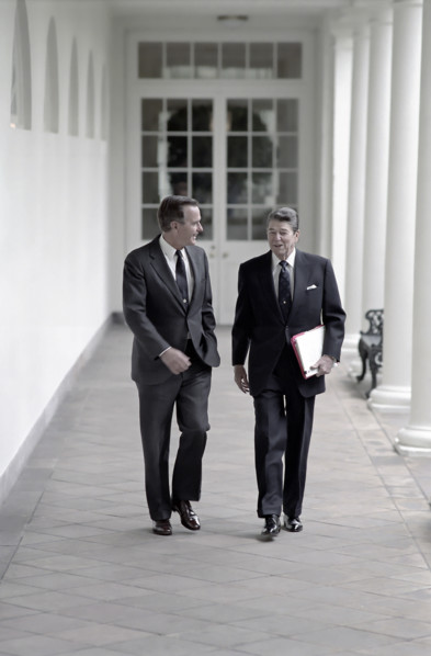 U.S. President Ronald Reagan and U.S. Vice President George H.W. Bush walking along White House