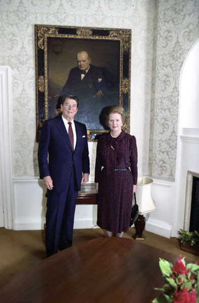 U.S. President Ronald Reagan and British Prime Minister Margaret Thatcher standing in front of