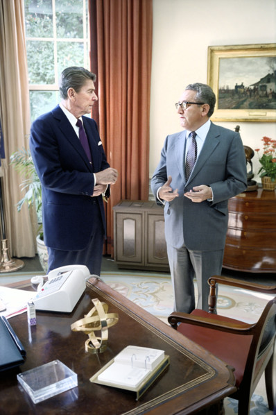U.S. President Ronald Reagan meeting with former U.S. Secretary of State Henry Kissinger in White