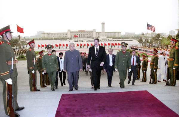 U.S. President Ronald Reagan walking with President of the People's Republic of China  at Reagan's
