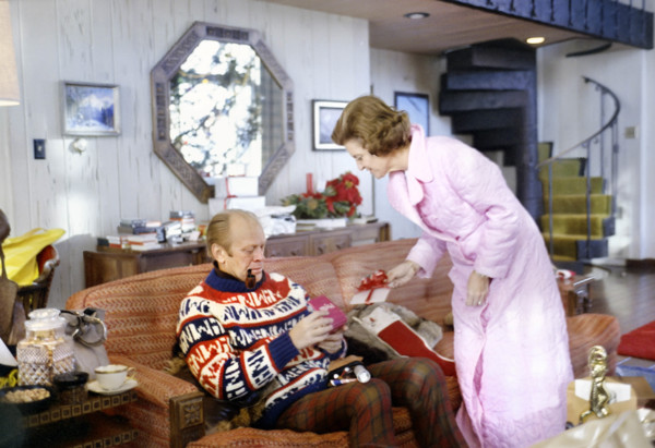 U.S. President Gerald R. Ford and U.S. First Lady Betty Ford opening presents on Christmas morning,