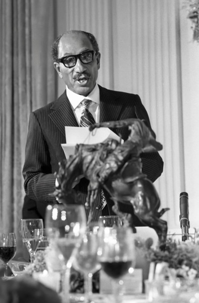 President Anwar Sadat of Egypt delivering a toast at White House state dinner held in his honor,