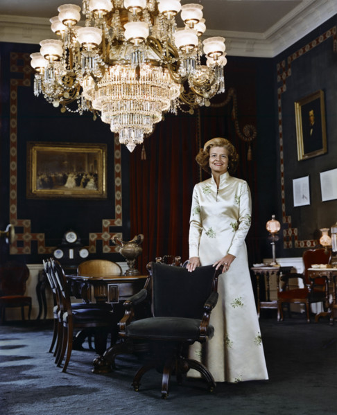 U.S. First Lady Betty Ford, full-length portrait in long white satin gown, White House Treaty Room,