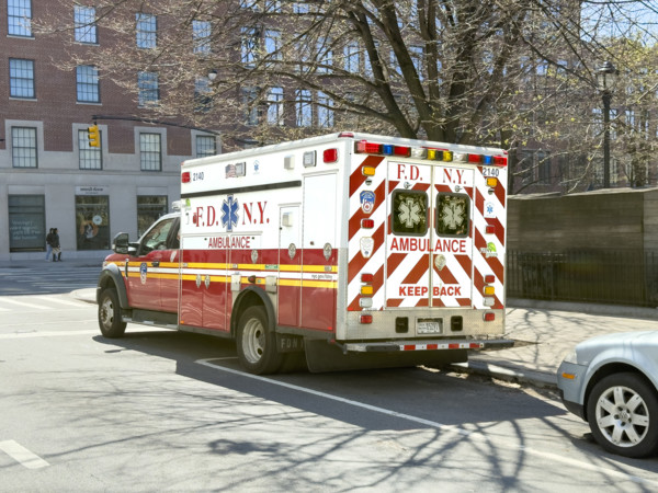 New York City Fire Department EMS ambulance parked on urban street, Chelsea, Manhattan, New York
