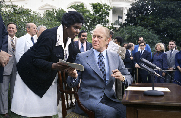 U.S. President Gerald R. Ford and U.S. Representative Barbara Jordan of Texas at signing Ceremony