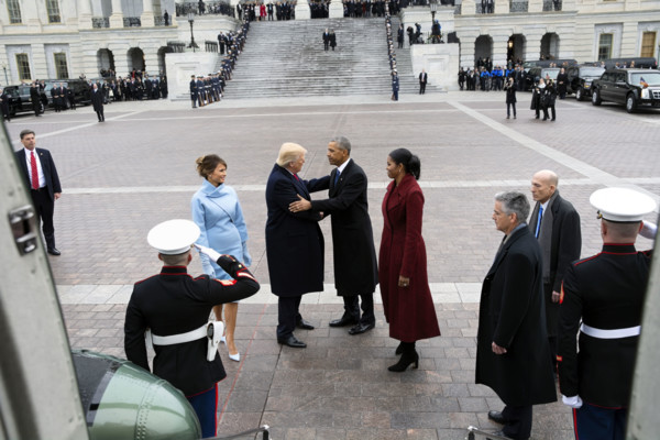 Former U.S. President Barack Obama and former U.S. First Lady Michelle Obama bid farewell to U.S.