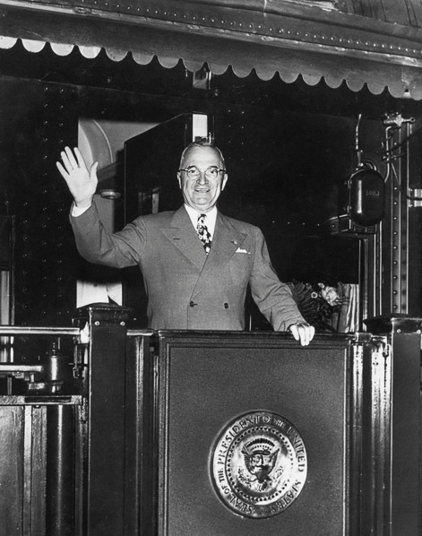 U.S. President Harry S. Truman waving from rear platform of train as he begins his 1948