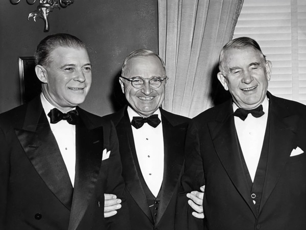 U.S. President Harry S. Truman (center), U.S. Vice President Alben Barkley (right), and