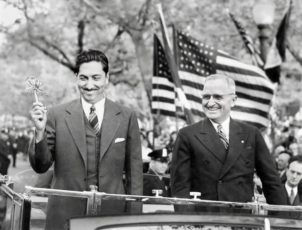 President Miguel Aleman of Mexico (left) holding ceremonial key to city while  U.S. President Harry