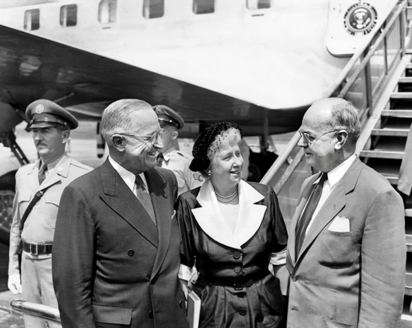 U.S. President Harry S. Truman (left) and U.S. First Lady Bess W. Truman (center) speak with