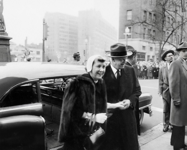 U.S. President-elect Dwight D. Eisenhower and his wife Mamie Eisenhower exiting car to attend