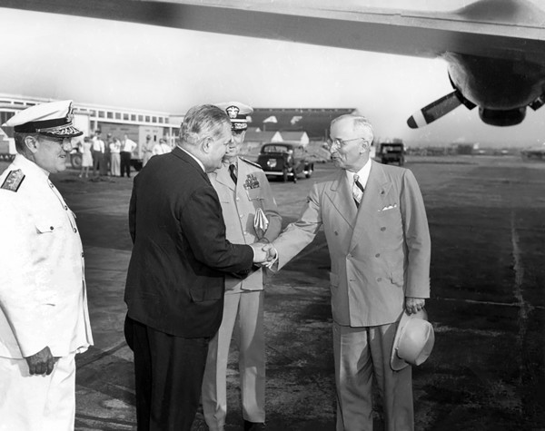 U.S. President Harry S. Truman shaking hands with Brazilian Ambassador Carlos Martins as they