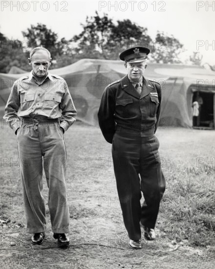 British Field Marshal Bernard L. Montgomery (left) briefing U.S. General Dwight D. Eisenhower