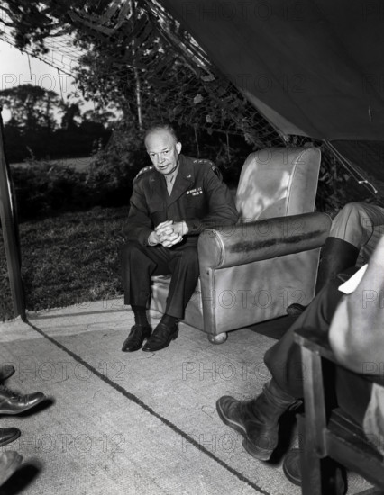 U.S. General Dwight D. Eisenhower holding press conference for war correspondents at his advance
