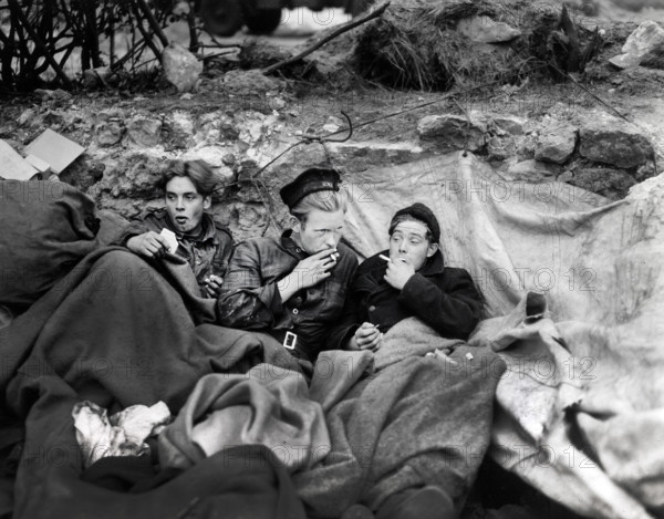 British crew members of an LST having their first night of decent rest after having been brought to