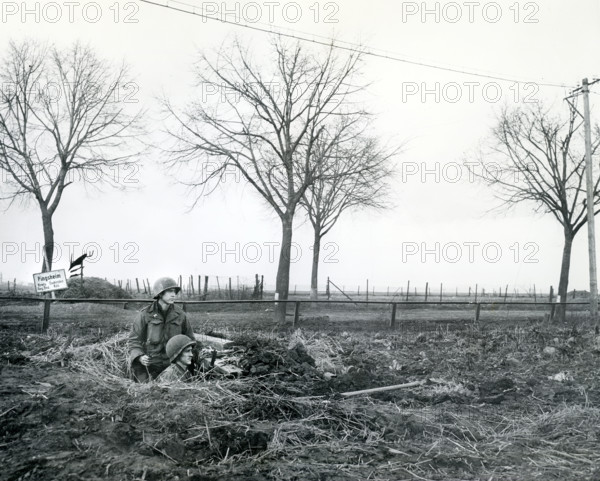 James E.J. Jentry of Bristol, Tennessee and Pfc. John W. Harris of Portland, Oregon, infantrymen of