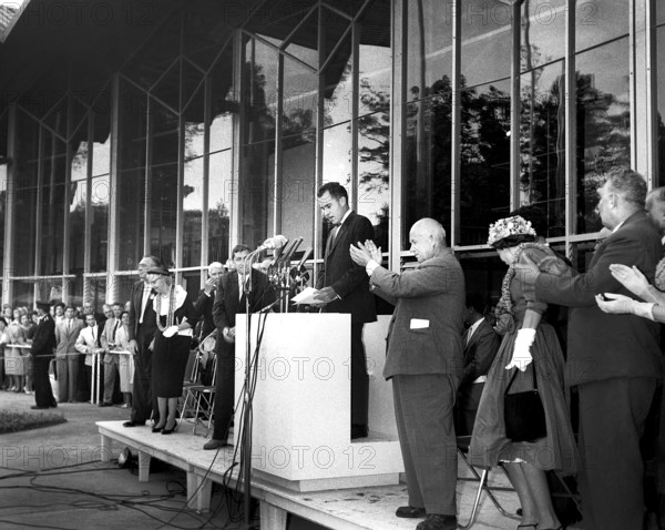 U.S. Vice President Richard Nixon making speech, Soviet Premier Nikita Khrushchev standing and