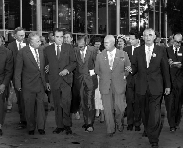 U.S. Vice President Richard Nixon and wife Pat Nixon (background center-right wearing hat) with