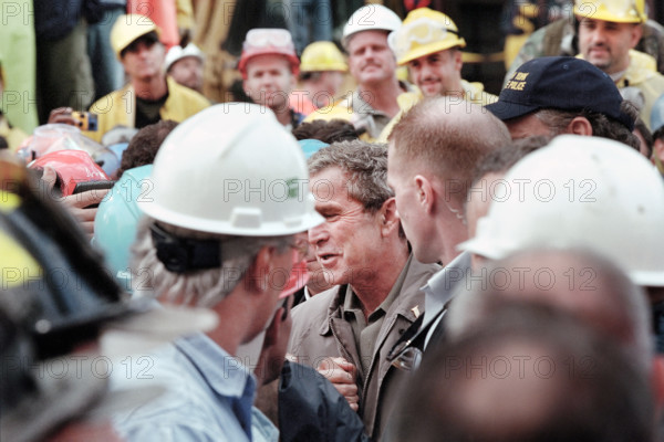 U.S. President George W. Bush greeting firefighters, police and rescue personnel at World Trade