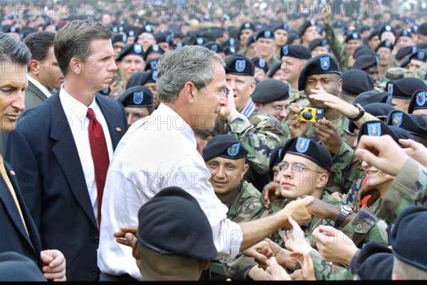 U.S. President George W. Bush greeting U.S. troops and guests after delivering remarks, Fort Drum,
