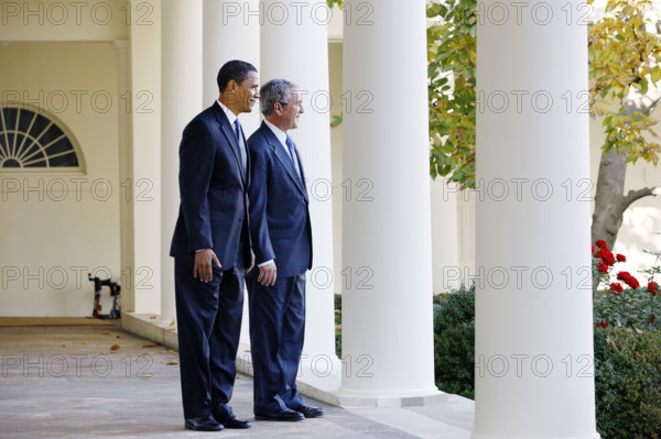 U.S. President George W. Bush and U.S. President-elect Barack Obama standing on White House