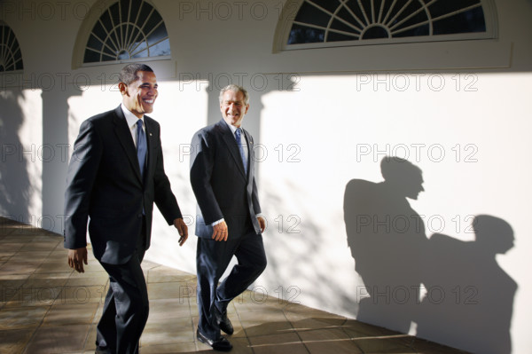 U.S. President George W. Bush and U.S. President-elect Barack Obama walking along White House